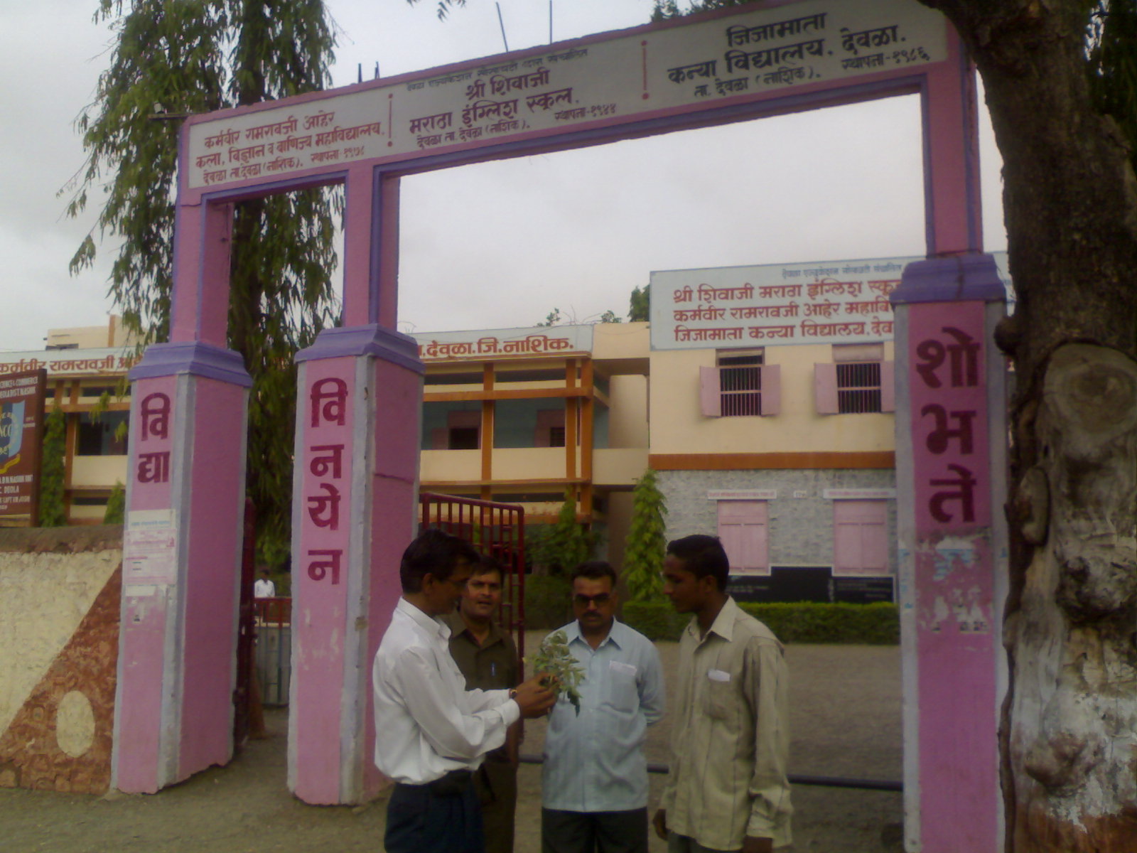 Discussion With Farmer at College Gate